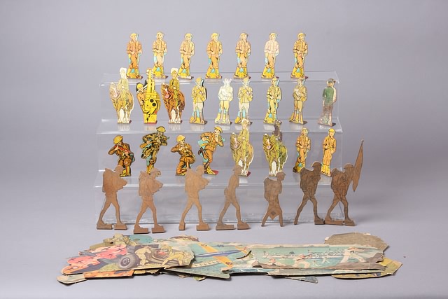 Appraisal: Lot of wooden Doughboys metal Marx one-dimensional Doughboys with cardboard