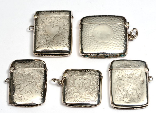 Appraisal: A COLLECTION OF FIVE SILVER VESTA CASES mostly with engraved