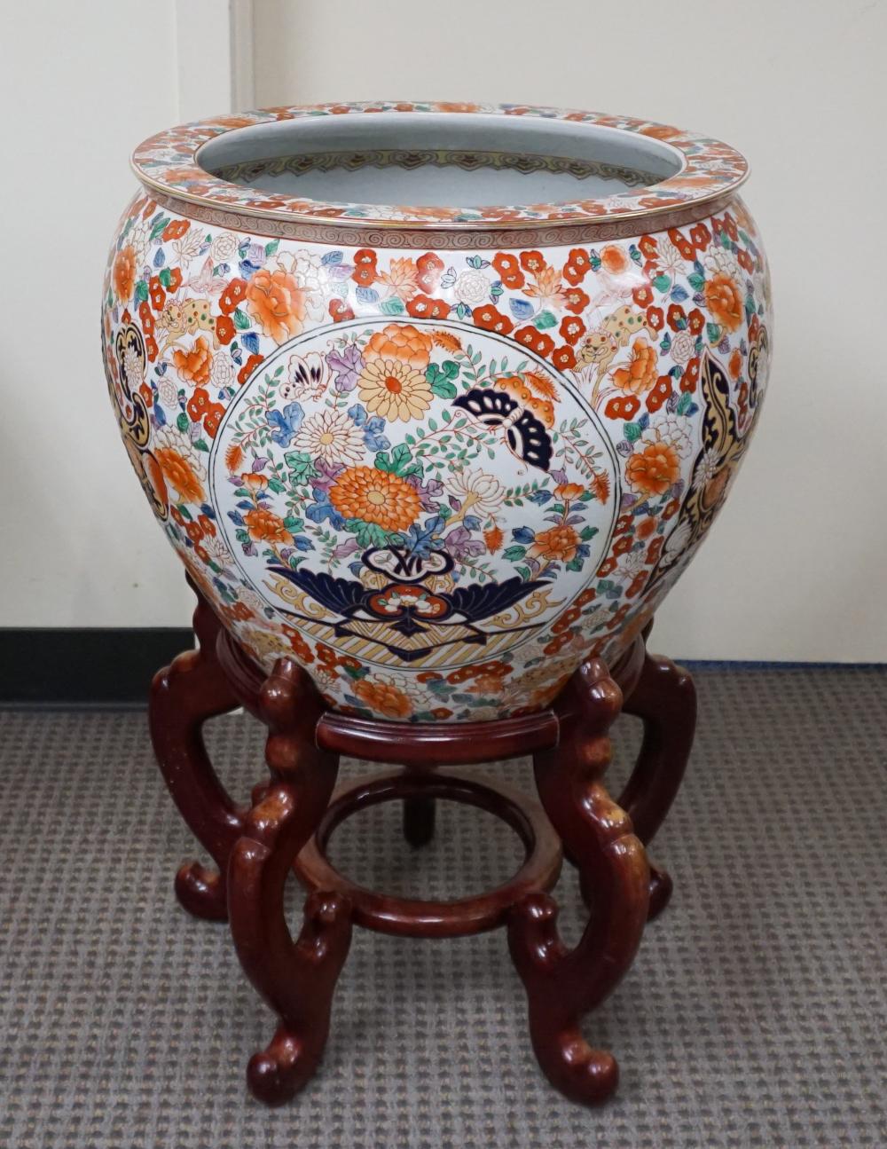 Appraisal: ASIAN POLYCHROME DECORATED FISH BOWL WITH STAND H WITH STAND