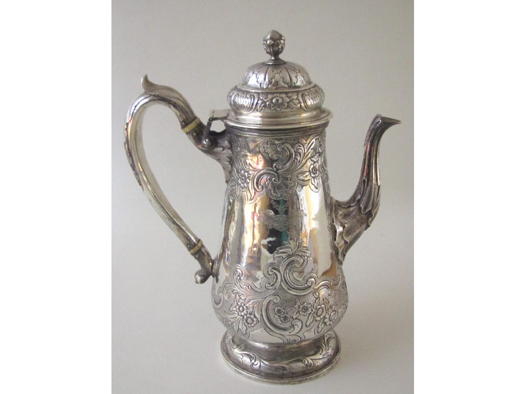 Appraisal: A George II silver baluster coffee pot the double domed