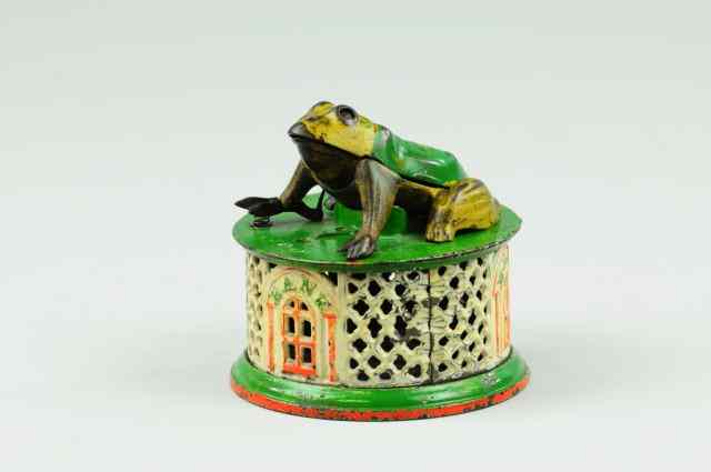 Appraisal: FROG ON ROUND BASE MECHANICAL BANK Green and white base