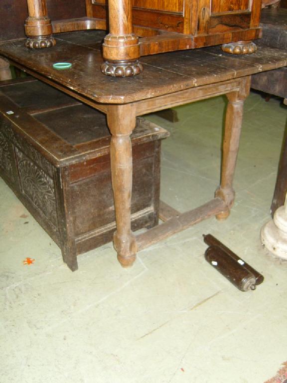 Appraisal: A Georgian oak plank top refectory table with canted corners