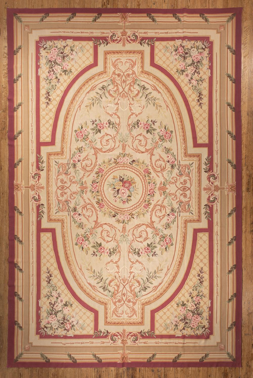 Appraisal: Aubusson Carpet central cartouche and spandrels with floral sprays ft