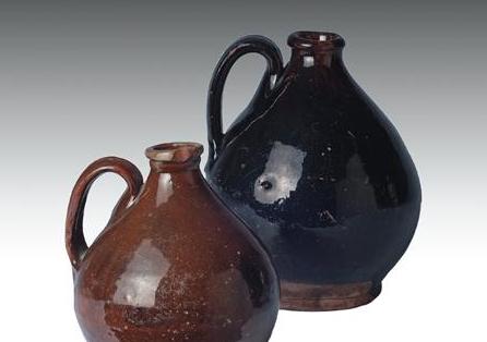 Appraisal: TWO BRISTOL COUNTY MASSACHUSETTS BROWN-GLAZED REDWARE MINIATURE JUGS - The