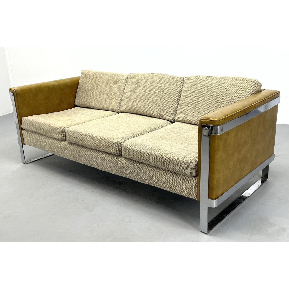 Appraisal: Milo Baughman Attributed Chrome Frame Modernist Sofa Gold vinyl arms