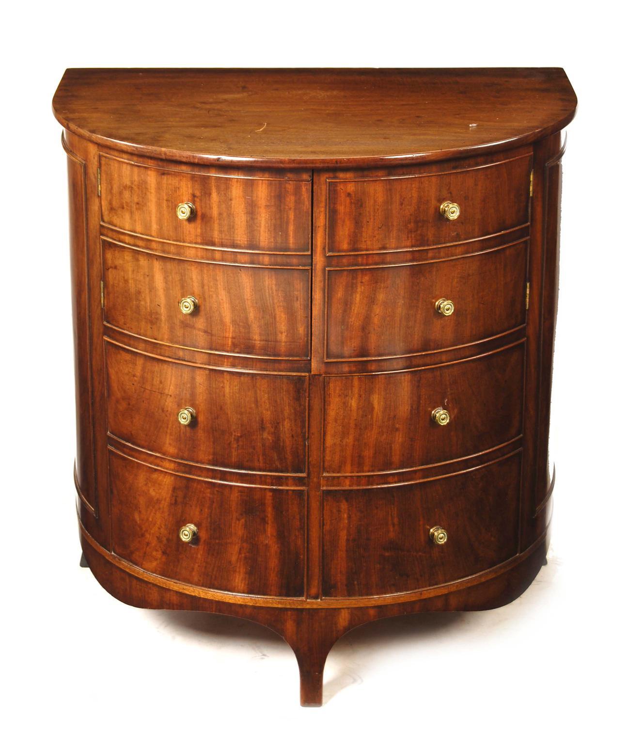 Appraisal: A George III mahogany demi-lune commode chest