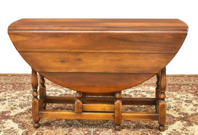 Appraisal: English drop-leaf table th c having an oval top over