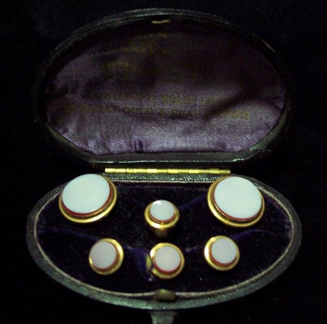 Appraisal: Six dress studs mounted circular cornelians with ivory backs