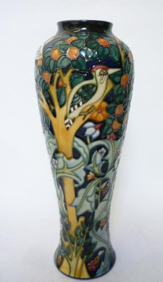 Appraisal: A MOORCROFT POTTERY TALL VASE modern of slender inverted baluster