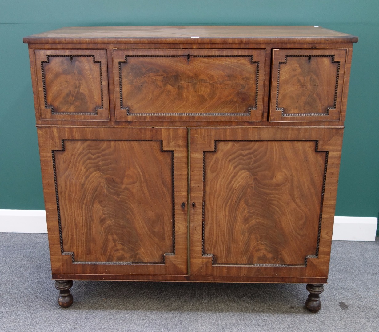 Appraisal: A William IV mahogany secretaire of unusual configuration the short