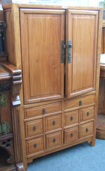 Appraisal: A th century Chinese ash food cupboard with a pair