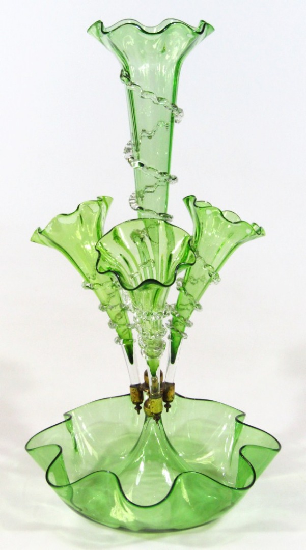 Appraisal: A green and clear glass epergne centred by a trumpet