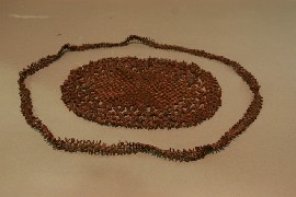 Appraisal: A rare Tasmanian table mat in apple seeds with apple