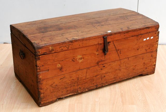 Appraisal: A mid- th century oak domed trunk with iron handles