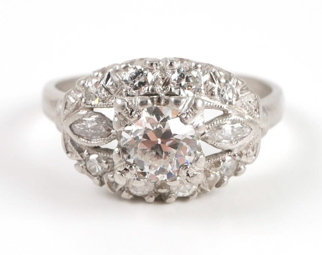 Appraisal: Platinum ring contains round transitional cut diamond Ct Approx Rated