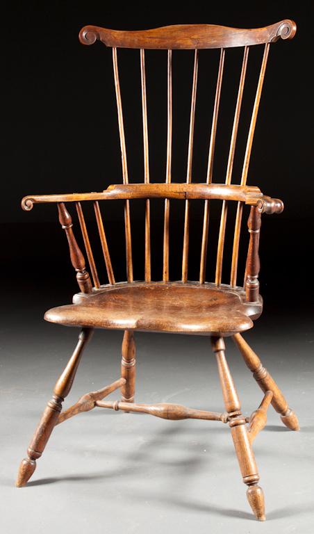 Appraisal: American carved oak comb-back windsor armchair stamped Brenner or Brewer