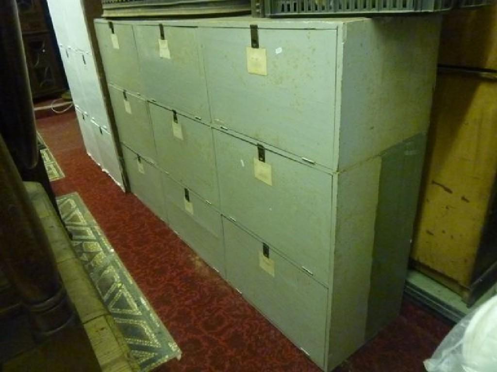 Appraisal: A vintage painted pine filing cabinet with nine compartments enclosed