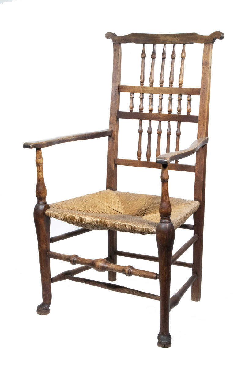 Appraisal: TH C ENGLISH ARMCHAIR Spindle Back Country Armchair in elm