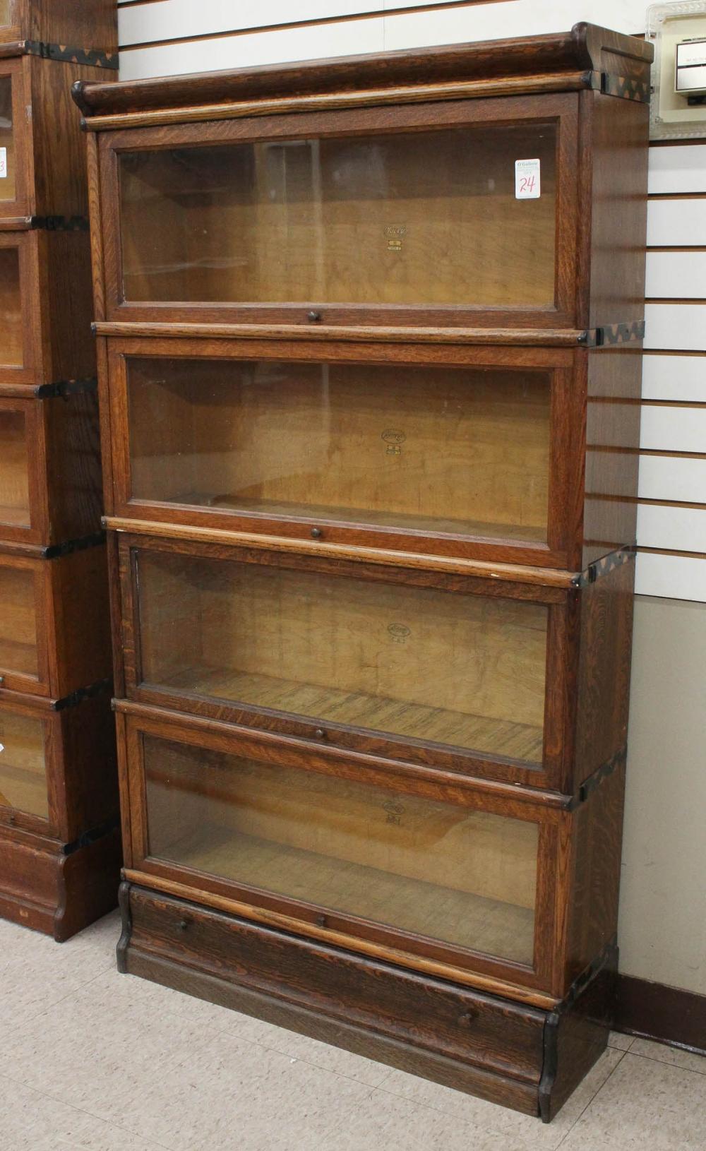 Appraisal: FOUR-SECTION STACKING OAK BOOKCASE The Macey Co Grand Rapids Michigan