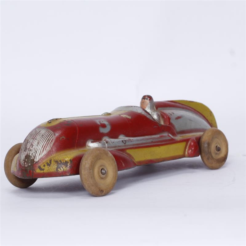 Appraisal: Arcor Red Yellow Silver Rubber Racer Loss to paint L