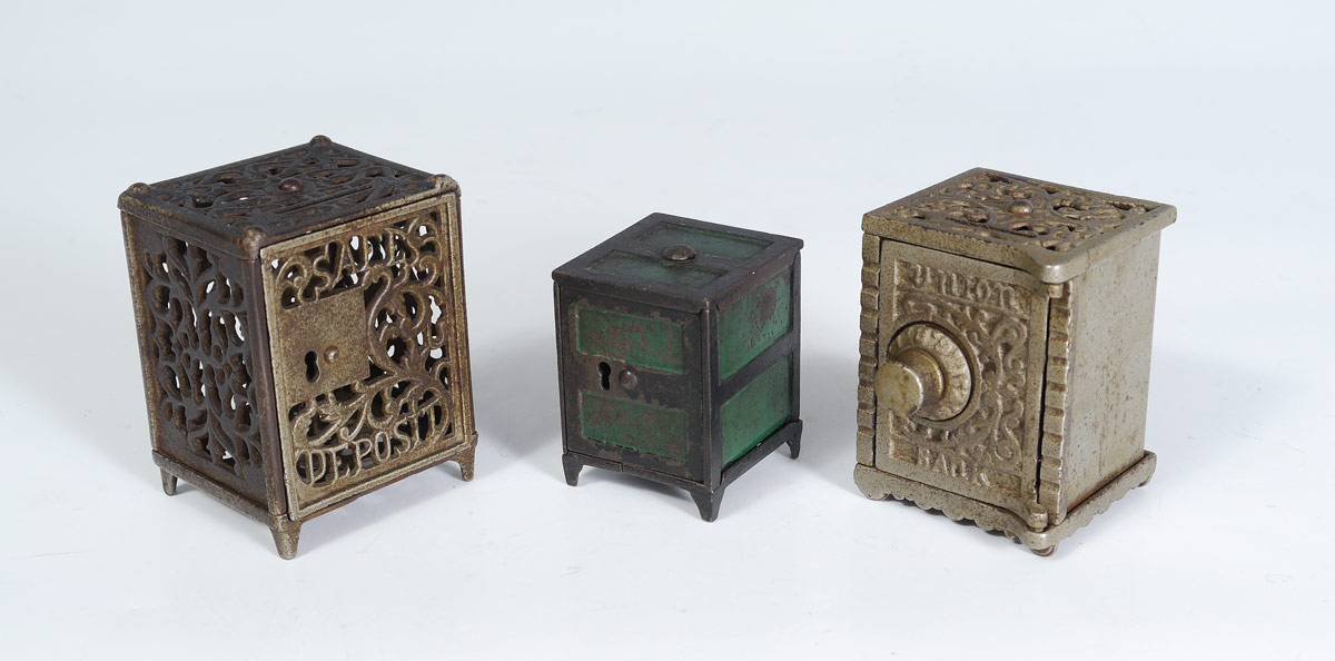 Appraisal: CAST IRON SAFE STILL BANK pieces total to include ''Safe