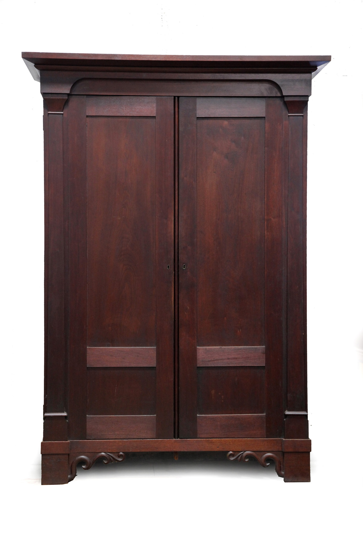 Appraisal: NEOCLASSICAL WARDROBE American nd quarter- th century walnut Beveled cornice