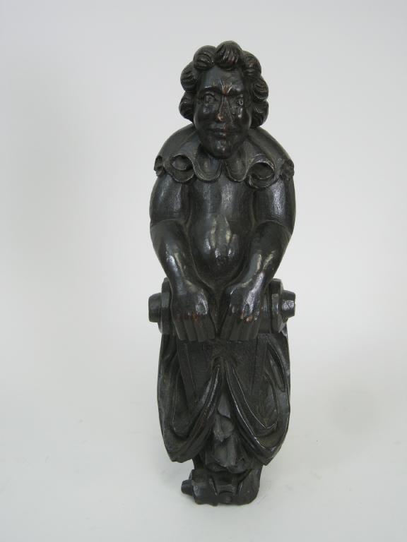 Appraisal: A th Century carved Corbel in the form of a