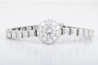 Appraisal: Diamond Cluster Line Bracelet Diamond bracelet with center diamond weight