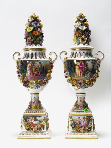 Appraisal: Pair of Dresden scenic lidded urns handles and reticulated design