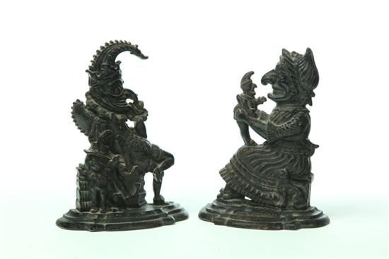 Appraisal: PAIR OF PUNCH AND JUDY DOORSTOPS England ca cast iron