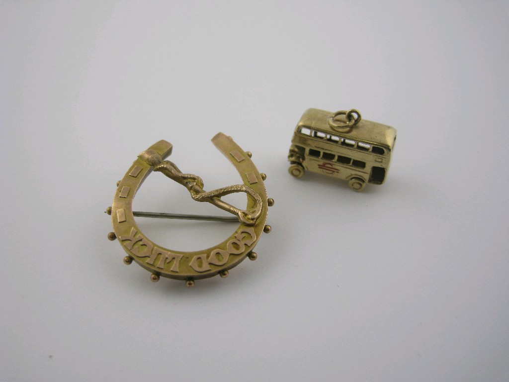 Appraisal: A ct gold Horseshoe and Whip Brooch embossed Good Luck