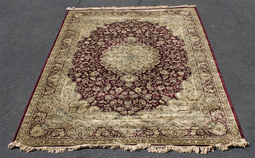 Appraisal: MACHINE MADE MEDALLION DESIGN ORIENTAL WOOL RUG central design with