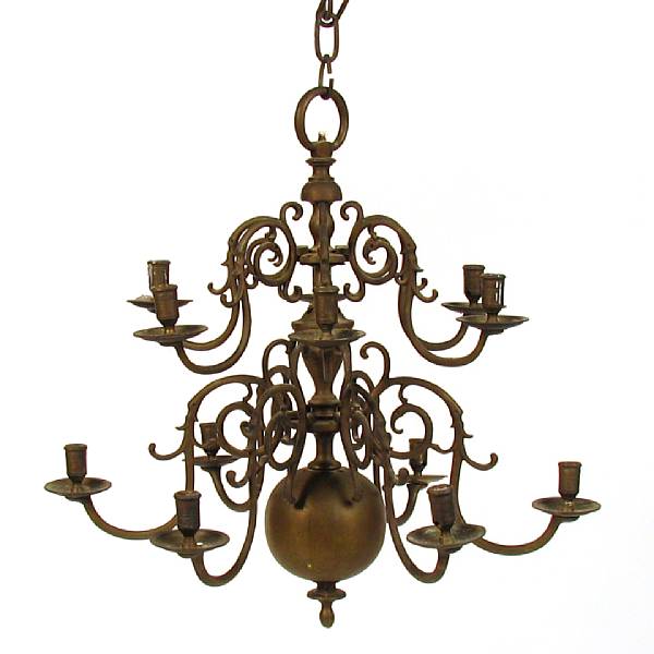 Appraisal: A Dutch Baroque style twelve light brass chandelier height in