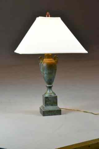 Appraisal: TABLE LAMP WITH COPPER FINISHAn urn shaped copper finished table