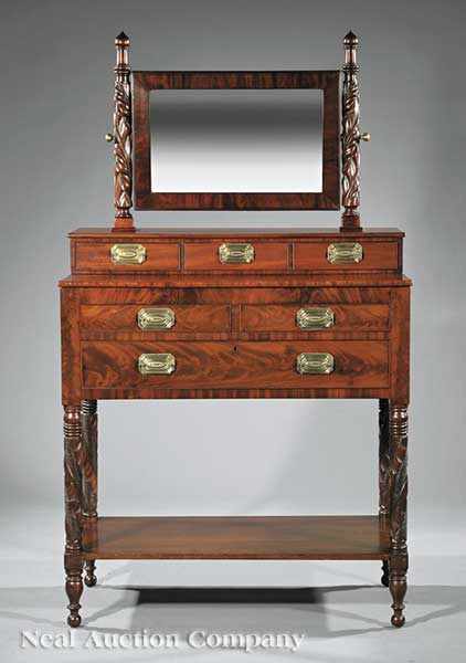 Appraisal: An American Classical Carved Mahogany Gentleman's Dressing Table c -