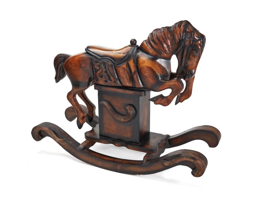 Appraisal: A large Carousel-style carved wood rocking horse Fourth-Quarter th Century