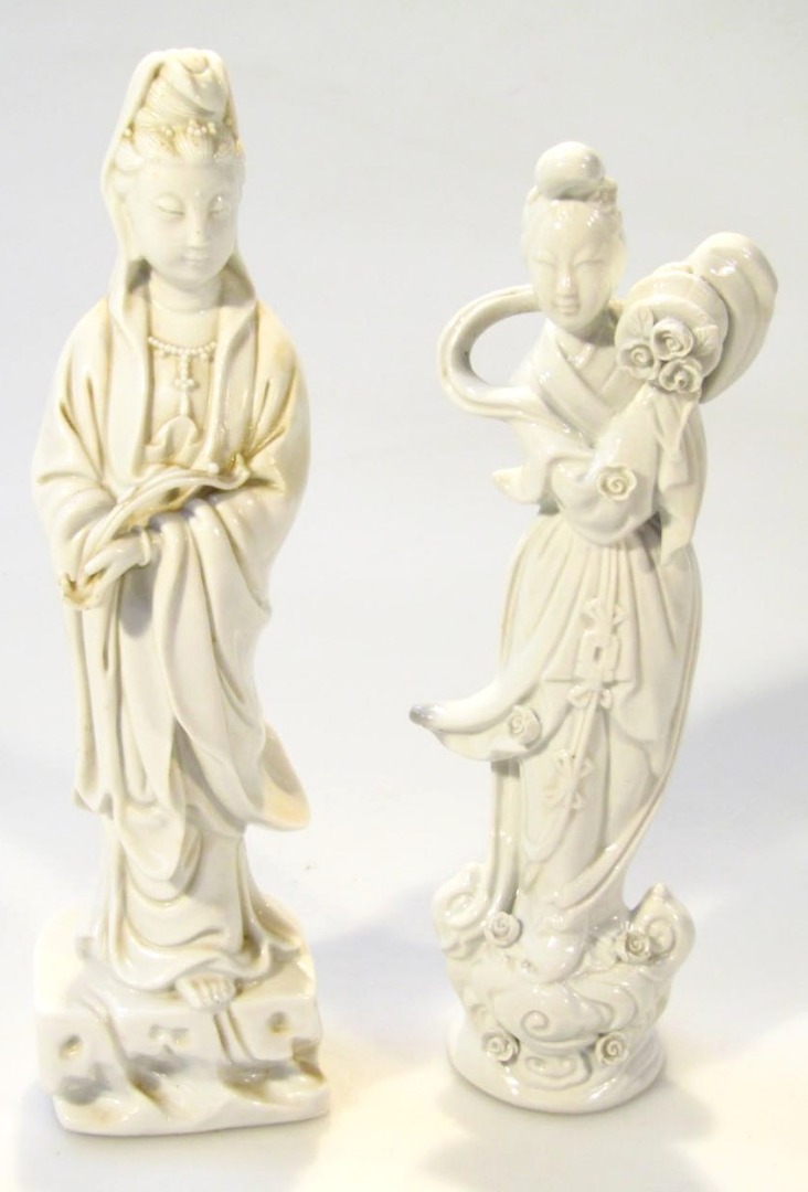 Appraisal: Two blanc de chine figures comprising a lady in flowing