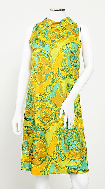 Appraisal: A s halterneck satin shift dress in a psychedelic green