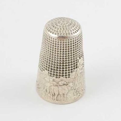 Appraisal: A late th century French thimble stamped around the lower