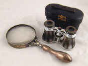 Appraisal: A pair of m o p opera glasses in leather