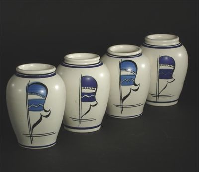 Appraisal: Four Poole Pottery limited edition Collector's Club vases painted in