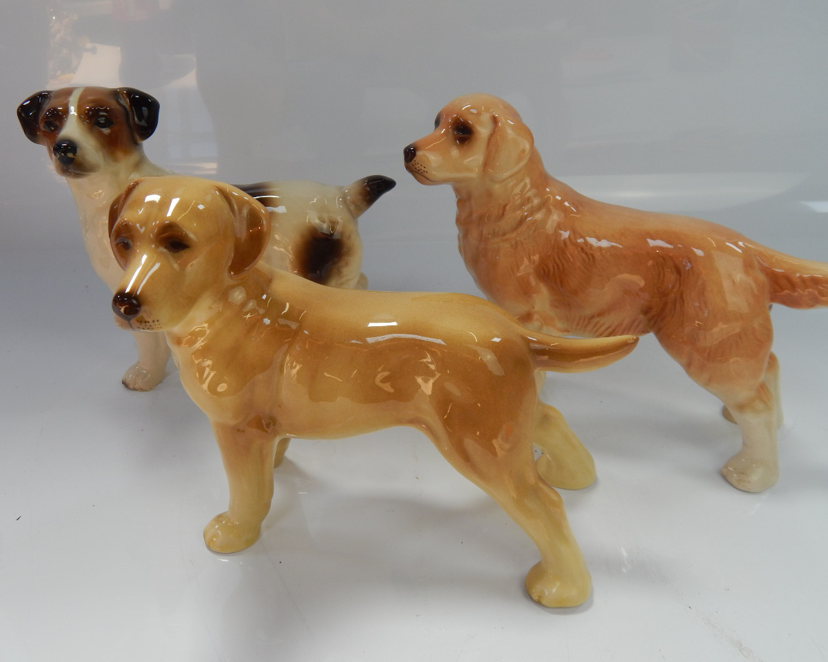 Appraisal: Three Coopercraft ceramic dogs