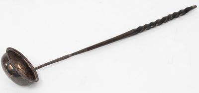 Appraisal: A George III silver toddy ladle marks rubbed with twisted