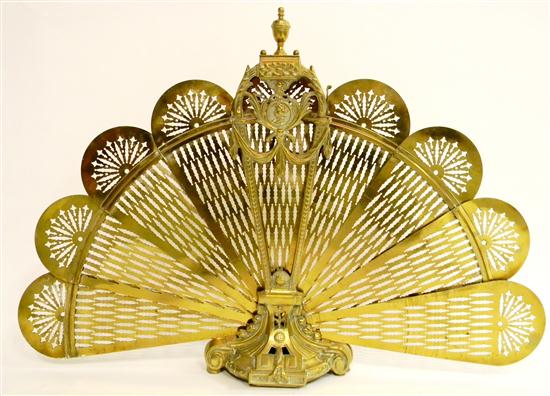 Appraisal: Brass fan folding fireplace screen central fixture ornamented with scrollwork