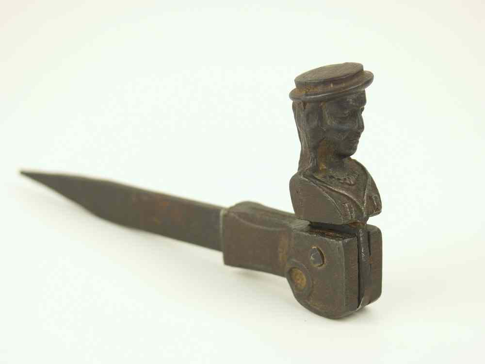 Appraisal: SHUTTER STOP - Cast iron figural form shutter stop ''L