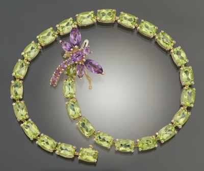 Appraisal: A Ladies' Peridot and Amethyst Bracelet k yellow gold bracelet