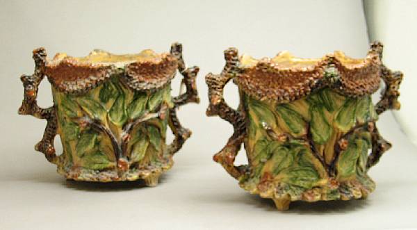 Appraisal: A pair of rustic glazed terracotta jardini res first half