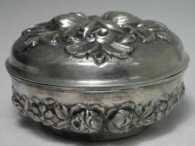 Appraisal: A continental silver dresser jar box or powder jar Decorated