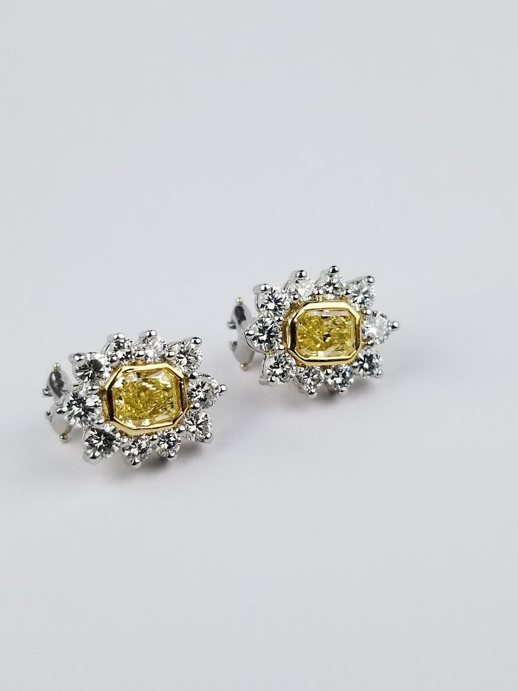 Appraisal: Pair of Platinum Yellow White Diamond Earrings Pair of Platinum