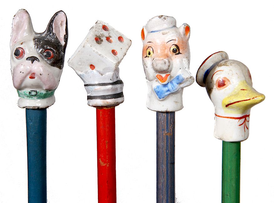 Appraisal: Collection of Carnival Canes- Four porcelain carnival canes with original